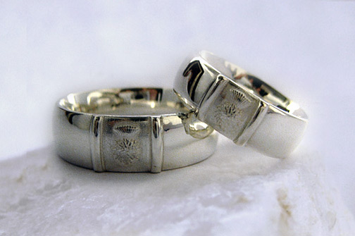 Photo - Custom wedding bands - Sterling Silver with thistle texture