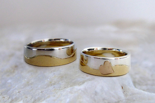 Photo - Custom wedding rings - Two tone: Sterling Silver, 14K Yellow and Rose Gold with heart